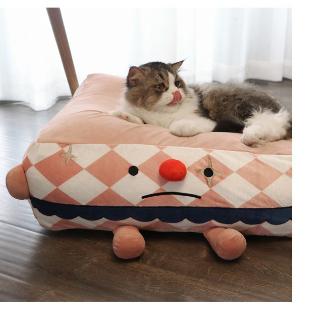 Clown Pet Sleeps In A Cozy Pet Bed - Heritage cosmetics and beauty care