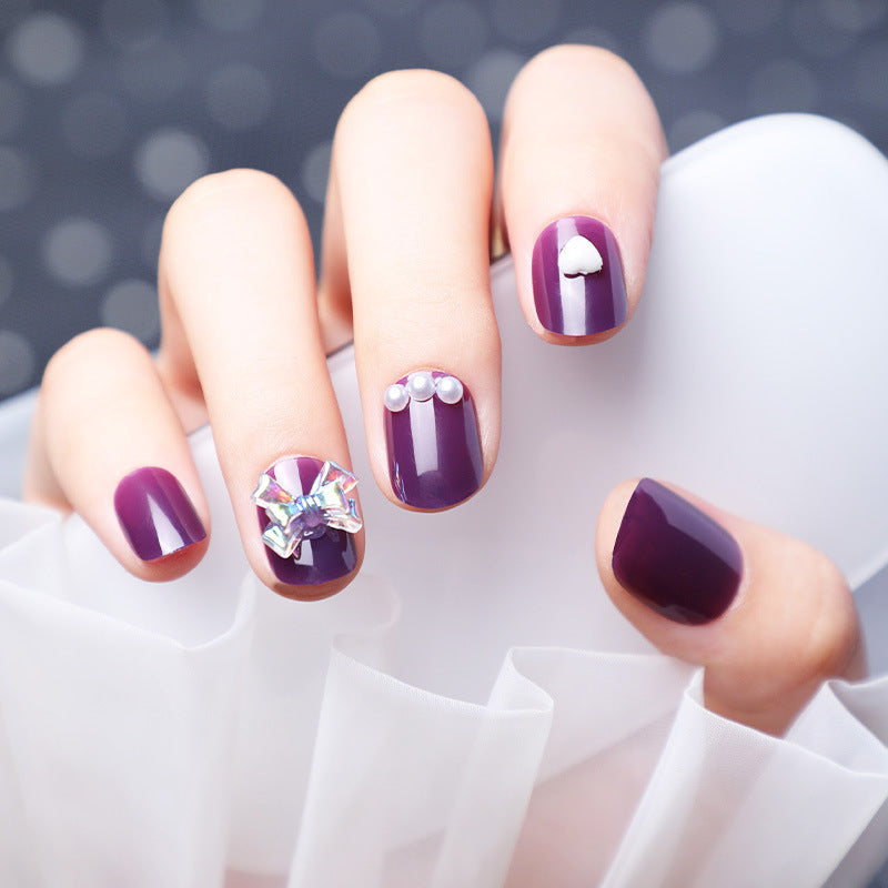 Wearing Nails With Diamonds And Purple Fake Nails - Heritage cosmetics and beauty care