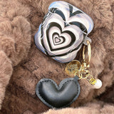 Black Stacked Heart Earphone Case Heritage cosmetics and beauty care