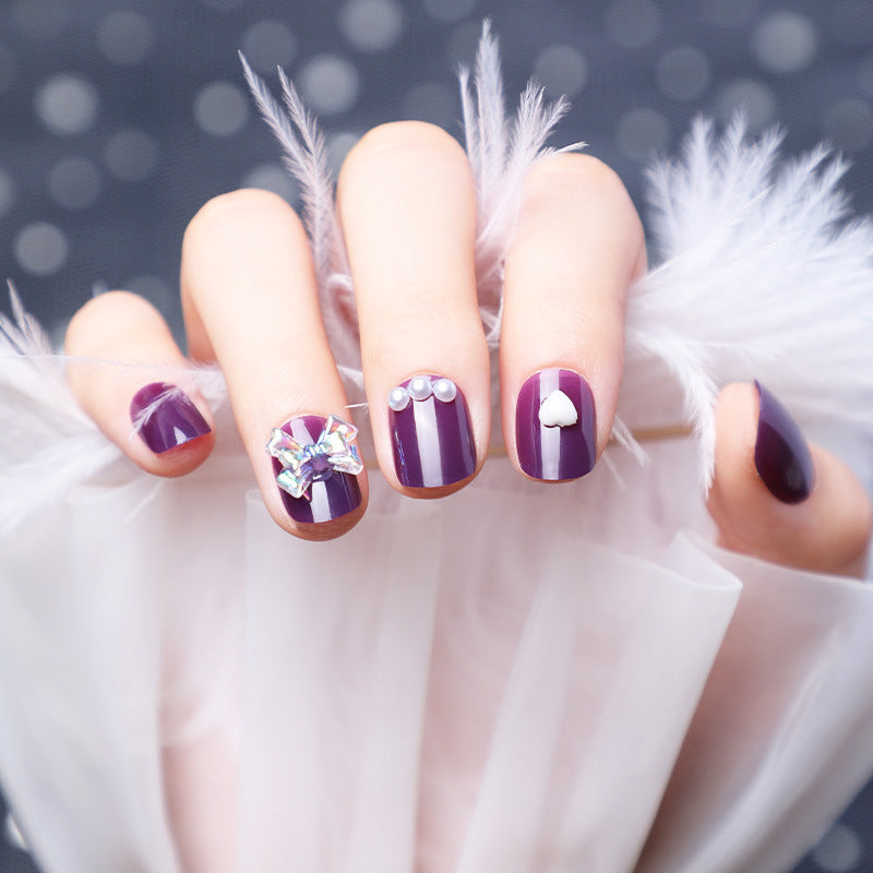 Wearing Nails With Diamonds And Purple Fake Nails - Heritage cosmetics and beauty care